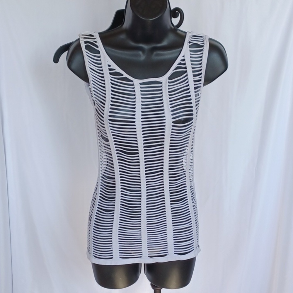 Women's shredded white rave muscle shirt, looks great over a sport bra or bikini